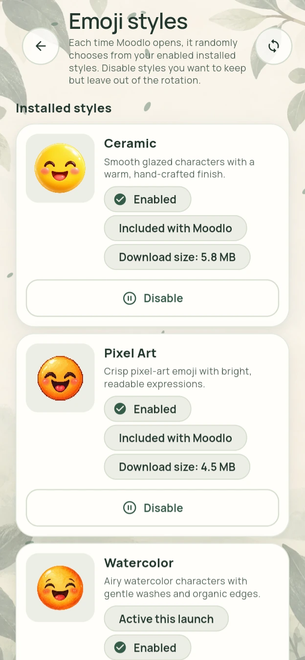 Moodlo emoji-style settings showing Ceramic, Pixel Art, and Watercolor packs.